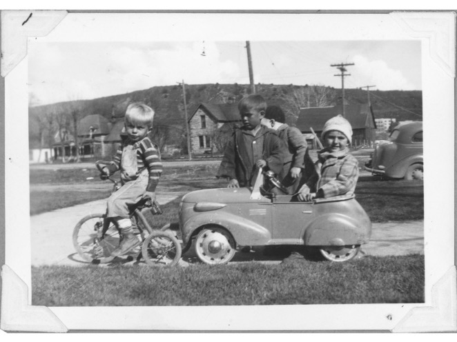 Kids in pedal car