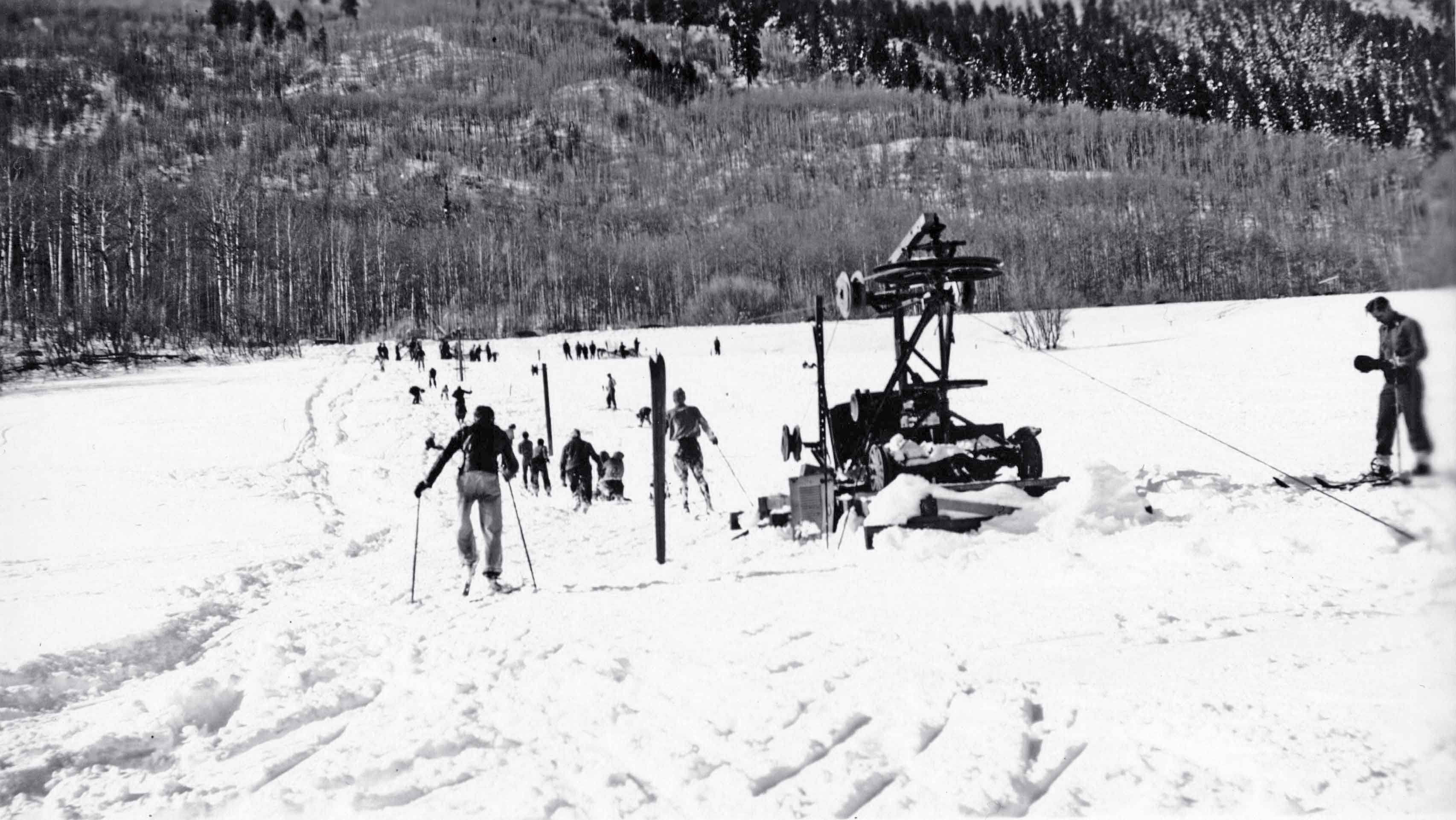 skier walking to rope tow